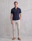 Modern Men's Zip-Up Polo Shirt - Stylish & Breathable Design on model - Dark Blue